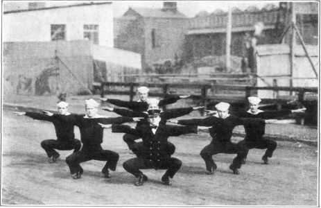 FIG. 10.&mdash;CROUCH

The "Crouch" is intended for the acquisition of balance and poise, but
is also good exercise for the legs. The back is kept straight and the
balance preserved throughout.