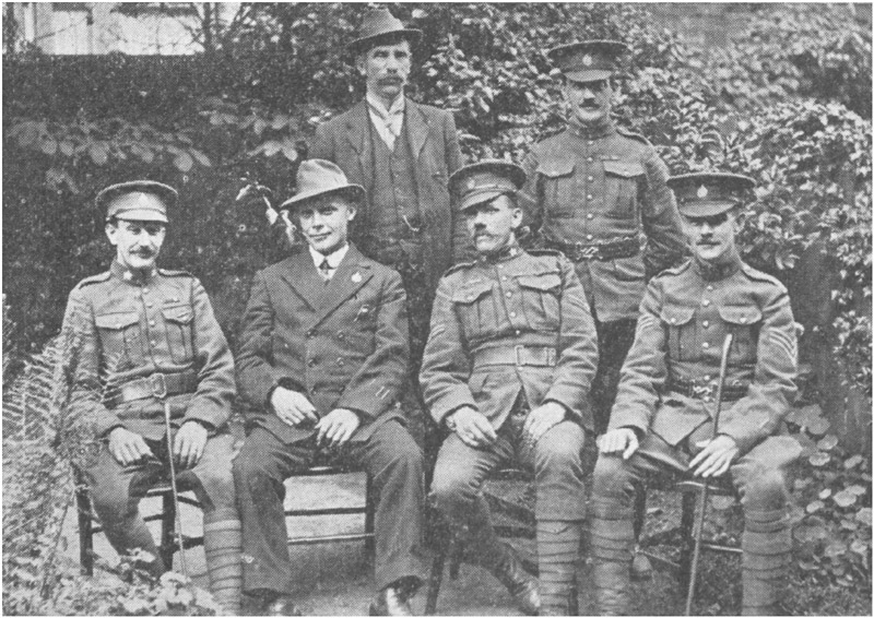Corporal Edwards (second from left) after his Escape