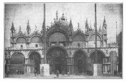 ST. MARK'S CATHEDRAL IN WAR GARB: THE BRONZE HORSES HAVE
BEEN REMOVED FROM OVER THE MAIN ENTRANCE, AND PARTS OF THE FACADE ARE
PROTECTED