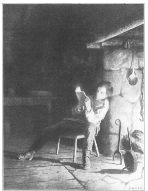 The boy Lincoln reading by the firelight in the log cabin
in which he was born.